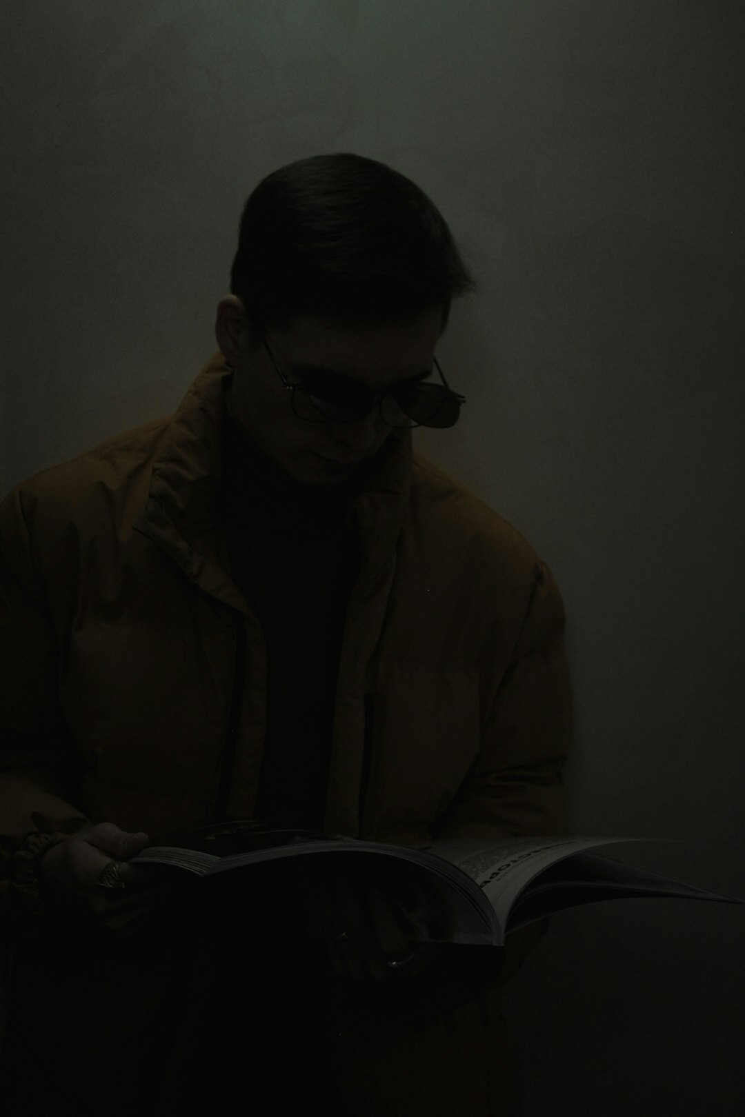 detective reading mystery book