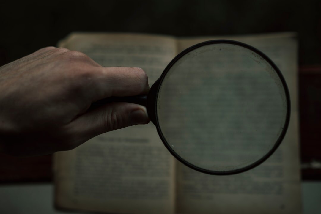 detective reading mystery book